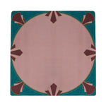 Deco Circle mahjong mat with a dusty pink circular center, teal border, and burgundy Art Deco fan motifs.