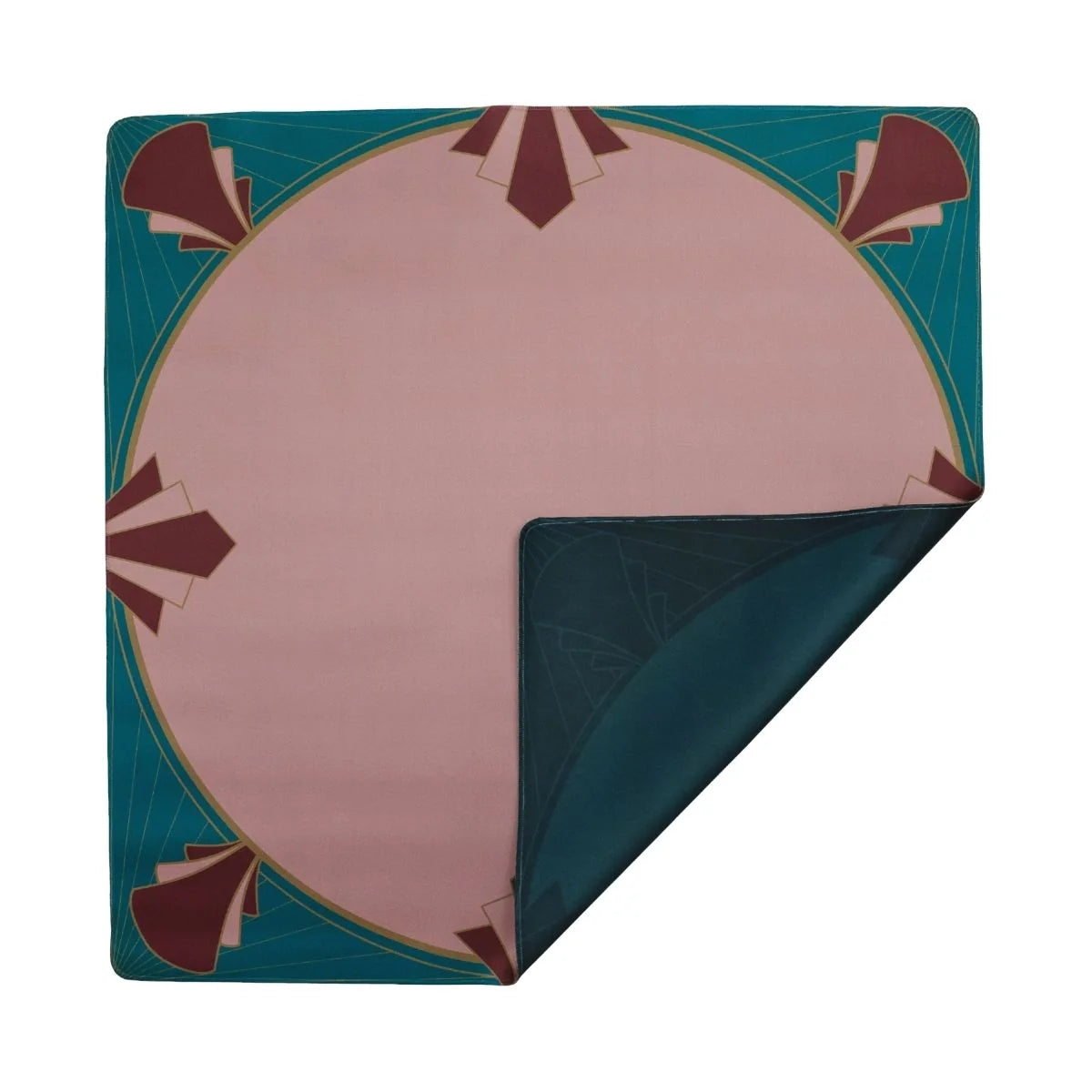 Deco Circle double-sided mahjong mat with a dusty pink center, teal border, and folded corner revealing the dark teal reverse.